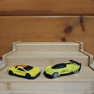 Lot Of 2 MAISTO Cars YELLOW 1:64 DIECAST 2 1/2" W/ RED STRIPES & GT Racer Green